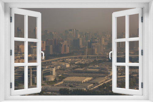 Fototapeta Naklejka Na Ścianę Okno 3D - Dubai shrouded in a sandstorm as seen from the air 