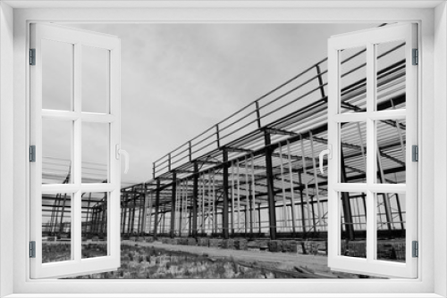 Fototapeta Naklejka Na Ścianę Okno 3D - The steel frame structure is under construction