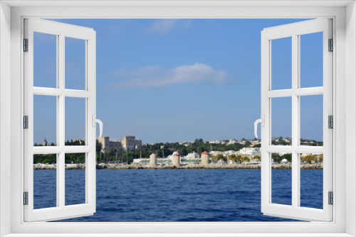 Fototapeta Naklejka Na Ścianę Okno 3D - View from the sea to the old town of Rhodes.