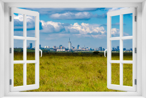 Fototapeta Naklejka Na Ścianę Okno 3D - View of Nairobi park savannah with city