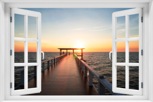 Fototapeta Naklejka Na Ścianę Okno 3D - Landscape of bridge in sea on tropical beach and sunset sky background .