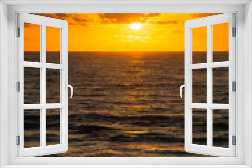 Fototapeta Naklejka Na Ścianę Okno 3D - A golden sunrise with reflection on the Atlantic Ocean on Delray Beach, Florida.