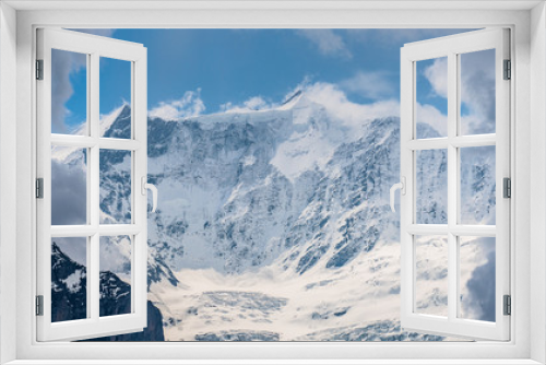 Fototapeta Naklejka Na Ścianę Okno 3D - Switzerland, panoramic view on snow Alps with clouds