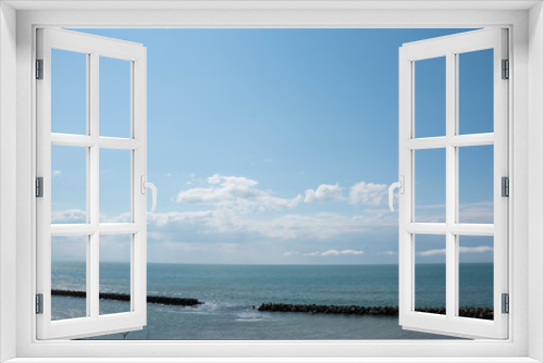 Fototapeta Naklejka Na Ścianę Okno 3D - 波消しブロックのある海と青空
