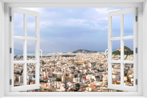 Fototapeta Naklejka Na Ścianę Okno 3D - Panoramic image of Athens from Acrpoli hill on evening sun.