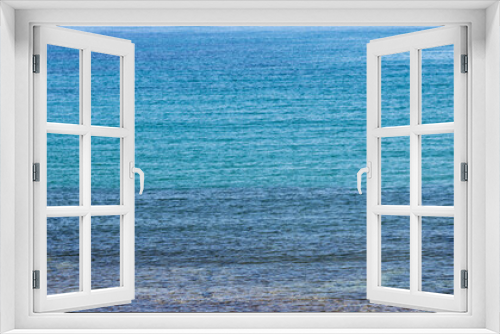 Fototapeta Naklejka Na Ścianę Okno 3D - Blue sea water surface. Calm sea background texture, banner