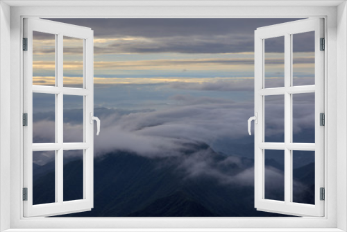 Fototapeta Naklejka Na Ścianę Okno 3D - Abstract photograph above the clouds, sea of clouds effect, flying through the sky, aerial view, white puffy clouds and blue sky. Low pressure front atmospheric effect, cloudscape, cloudy weather