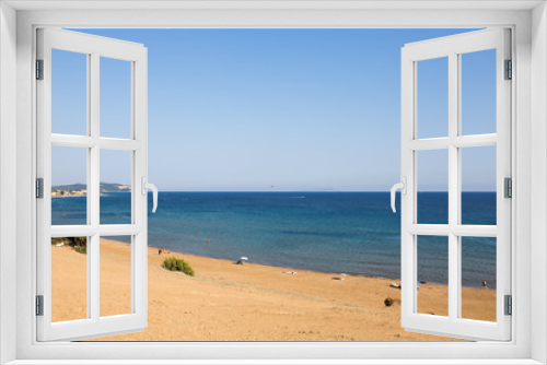 Fototapeta Naklejka Na Ścianę Okno 3D - A view of beach on Corfu, Greece, one of the Island's most popular resorts