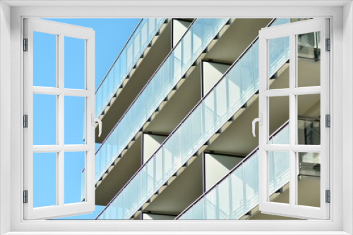 Fototapeta Naklejka Na Ścianę Okno 3D - Contemporary residential building exterior in the daylight