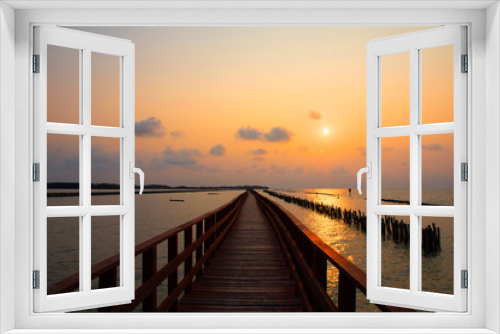 Fototapeta Naklejka Na Ścianę Okno 3D - Long Bridge at sea view on morning seascape sunrise background