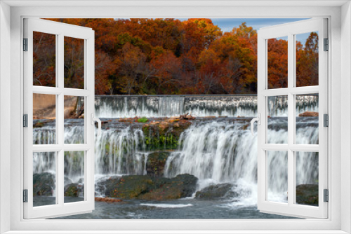 Fototapeta Naklejka Na Ścianę Okno 3D - Beautiful autumn colored trees and powerful water at The Falls in Joplin, MO.