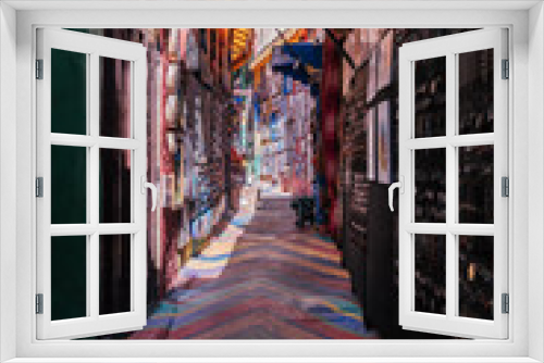 Fototapeta Naklejka Na Ścianę Okno 3D - A colorful alley of the winding Medina in Fes.