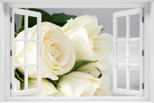 Fototapeta Naklejka Na Ścianę Okno 3D - White roses on a white wooden table