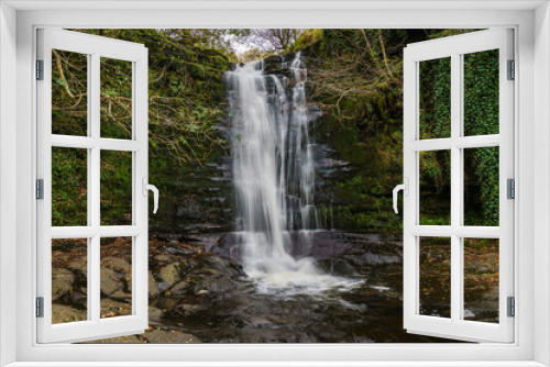 Fototapeta Naklejka Na Ścianę Okno 3D - A waterfall in Blaen-y-glyn near Torpantau, Powys, Wales, UK
