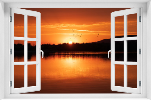 Fototapeta Naklejka Na Ścianę Okno 3D - Sunset on a lake in Hohenrode in Germany