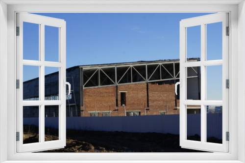 Fototapeta Naklejka Na Ścianę Okno 3D - construction, brick, steel beams, structures, hangar, boxing, workshop, scaffolding, fence, aviation