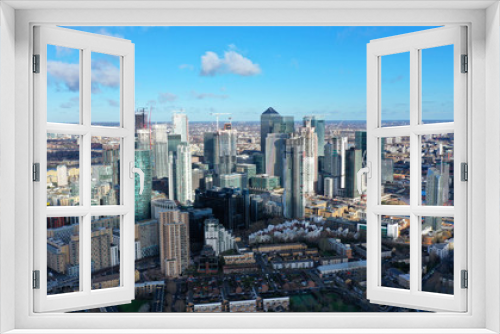 Fototapeta Naklejka Na Ścianę Okno 3D - Aerial bird's eye panoramic photo taken by drone of iconic Canary Wharf skyscraper complex and business district, Isle of Dogs, London, United Kingdom