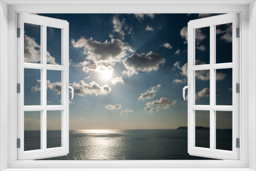 Fototapeta Naklejka Na Ścianę Okno 3D - 雲からあふれる太陽光線