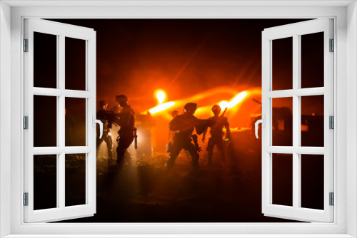 Fototapeta Naklejka Na Ścianę Okno 3D - War Concept. Military silhouettes fighting scene on war fog sky background, Fighting silhouettes Below Cloudy Skyline At night. Battle scene. Army vehicle with soldiers. army