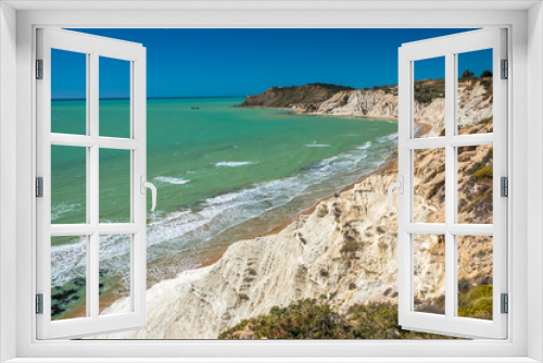 Fototapeta Naklejka Na Ścianę Okno 3D - The Scala dei Turchi (Stair of the Turks), a spectacular white rocky cliff on the coast of Sicily, Italy. The rock formation in the shape of a staircase lies between two sandy beaches.