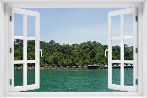 Fototapeta Naklejka Na Ścianę Okno 3D - Floating hotel houses and blue sky in Thailand