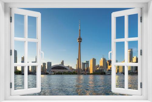 Fototapeta Naklejka Na Ścianę Okno 3D - Beautiful Toronto city skyline at sunset - Toronto, Ontario, Canada. 