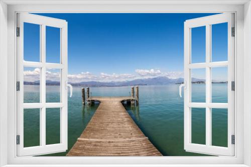 Fototapeta Naklejka Na Ścianę Okno 3D - Panoramic view of a beautiful morning over the Lake Garda, Italy