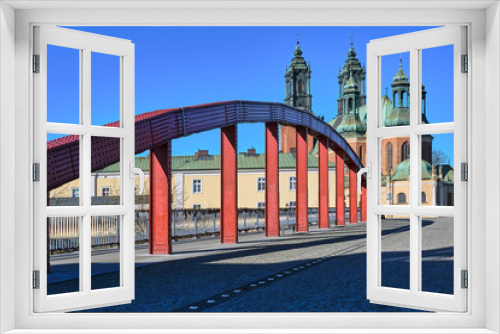Fototapeta Naklejka Na Ścianę Okno 3D - Steel structure of the bridge and towers of the Gothic cathedral in Poznan.