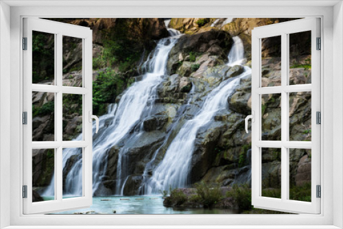 Fototapeta Naklejka Na Ścianę Okno 3D - Beautiful waterfall in green forest