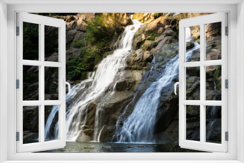 Fototapeta Naklejka Na Ścianę Okno 3D - Bokeh of natTropical rainforest waterfallure background