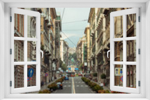 Fototapeta Naklejka Na Ścianę Okno 3D - Looking on the street in Genoa. Italy.