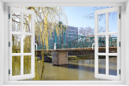 Fototapeta Naklejka Na Ścianę Okno 3D - Bridge of lovers in spring on the river Oder, Poland