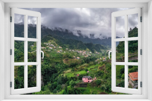 Fototapeta Naklejka Na Ścianę Okno 3D - Beautiful mountain village on Madeira island, Portugal. Panorama view.