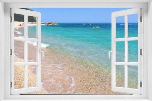 Fototapeta Naklejka Na Ścianę Okno 3D - seascape and natural landscape view on empty beach with cloudy blue sky in Sirolo Conero, Marche Italy