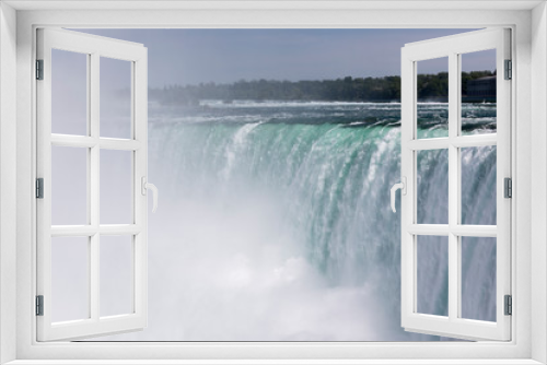 Fototapeta Naklejka Na Ścianę Okno 3D - Beautiful view of turbulent Niagara waterfall in summer