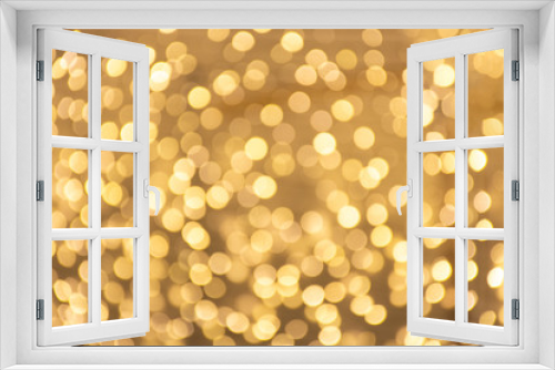 abstract golden background with bokeh lights