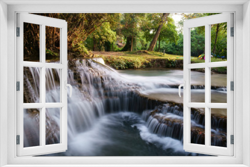 Fototapeta Naklejka Na Ścianę Okno 3D - picnic on stream and waterfall with tree in green jungle or forest for summer holiday relax and family vacation travel trip with trekking and camping on meadow or grass at Huai Mae Khamin Waterfall