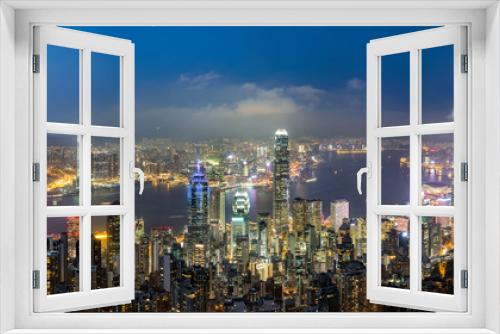 Fototapeta Naklejka Na Ścianę Okno 3D - Panorama view of Hong Kong skyline on the evening seen from Victoria peak, Hong Kong, China.