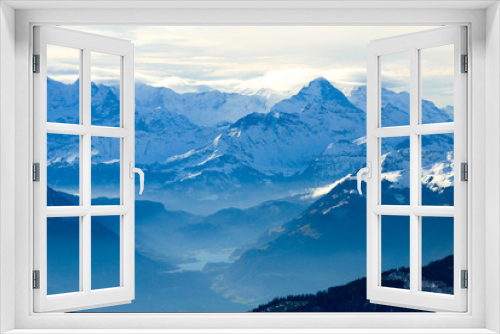 Fototapeta Naklejka Na Ścianę Okno 3D - 秋のピラトゥス山の山頂から見た風景　ベルナーオーバーラントの山々の遠望とルンゲルン湖（スイス・ベルン州、オプヴァルデン準州、ニトヴァルデン準州、ルツェルン州）