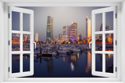 Fototapeta Naklejka Na Ścianę Okno 3D - Skyline of Kuwait City at evening