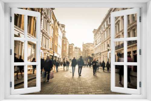 Fototapeta Naklejka Na Ścianę Okno 3D - People on a shopping street in motion blur