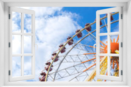 Fototapeta Naklejka Na Ścianę Okno 3D - Ferris wheel against the sky, vertical