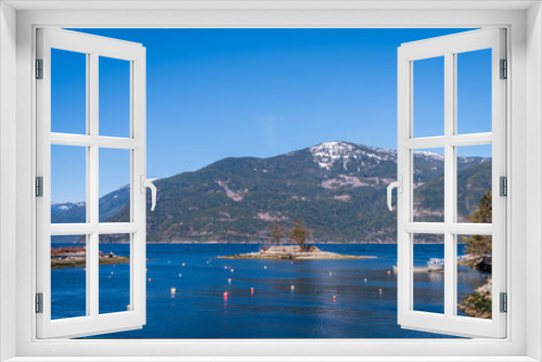 Fototapeta Naklejka Na Ścianę Okno 3D - Fantastic view over ocean, snow mountain and rocks at Burrard inlet in Vancouver, Canada.