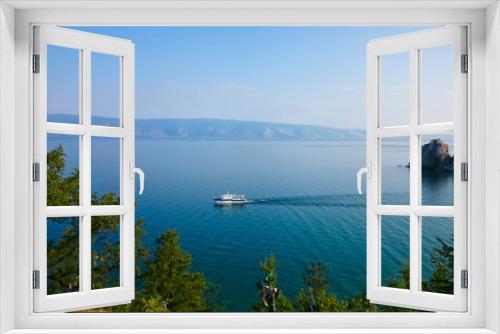 Fototapeta Naklejka Na Ścianę Okno 3D - View of Lake Baikal. Mountains, ship, sky. Olkhon Islands, Russia.