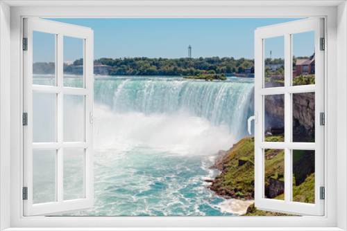 Fototapeta Naklejka Na Ścianę Okno 3D - Aerial top landscape view of Niagara Falls  between United States of America and Canada. Horseshoe of Canadian waterfall on sunny day. Water tour boat at famous tourist landmark