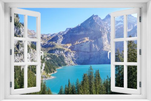 Fototapeta Naklejka Na Ścianę Okno 3D - Scenic Panorama picture or postcard view of Oeschinensee lake,Wooden chalet and Swiss Alps, Beautiful outdoor scene in Berner Oberland,Kandersteg Switzerland.Vacation Holiday. 
