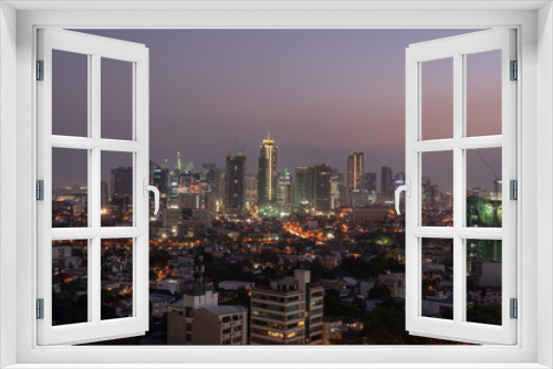 Fototapeta Naklejka Na Ścianę Okno 3D - Bonifacio Global city skyline at Magic hour	