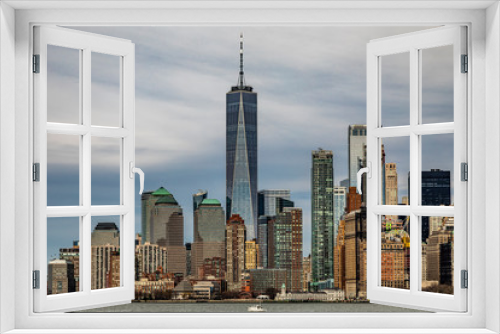 Fototapeta Naklejka Na Ścianę Okno 3D - Skyline of Manhattan in NYC USA seen from a ferry 