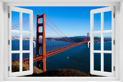 Fototapeta Naklejka Na Ścianę Okno 3D - Golden Gate Bridge with San Francisco, USA in background. Top view of bridge and the bay on a sunny day with copy space.