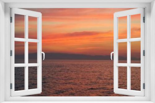 Fototapeta Naklejka Na Ścianę Okno 3D - tramonto sulle Eolie visto dal mare